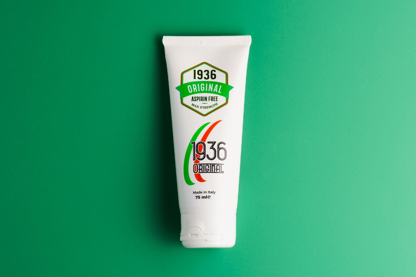 The 1936 Original Nodol Aspirin-Free Pain Cream comes in a white tube featuring green, red, and black text on a green background. It is a 75 ml remedy made in Italy that utilizes a natural formula to provide effective joint pain relief.